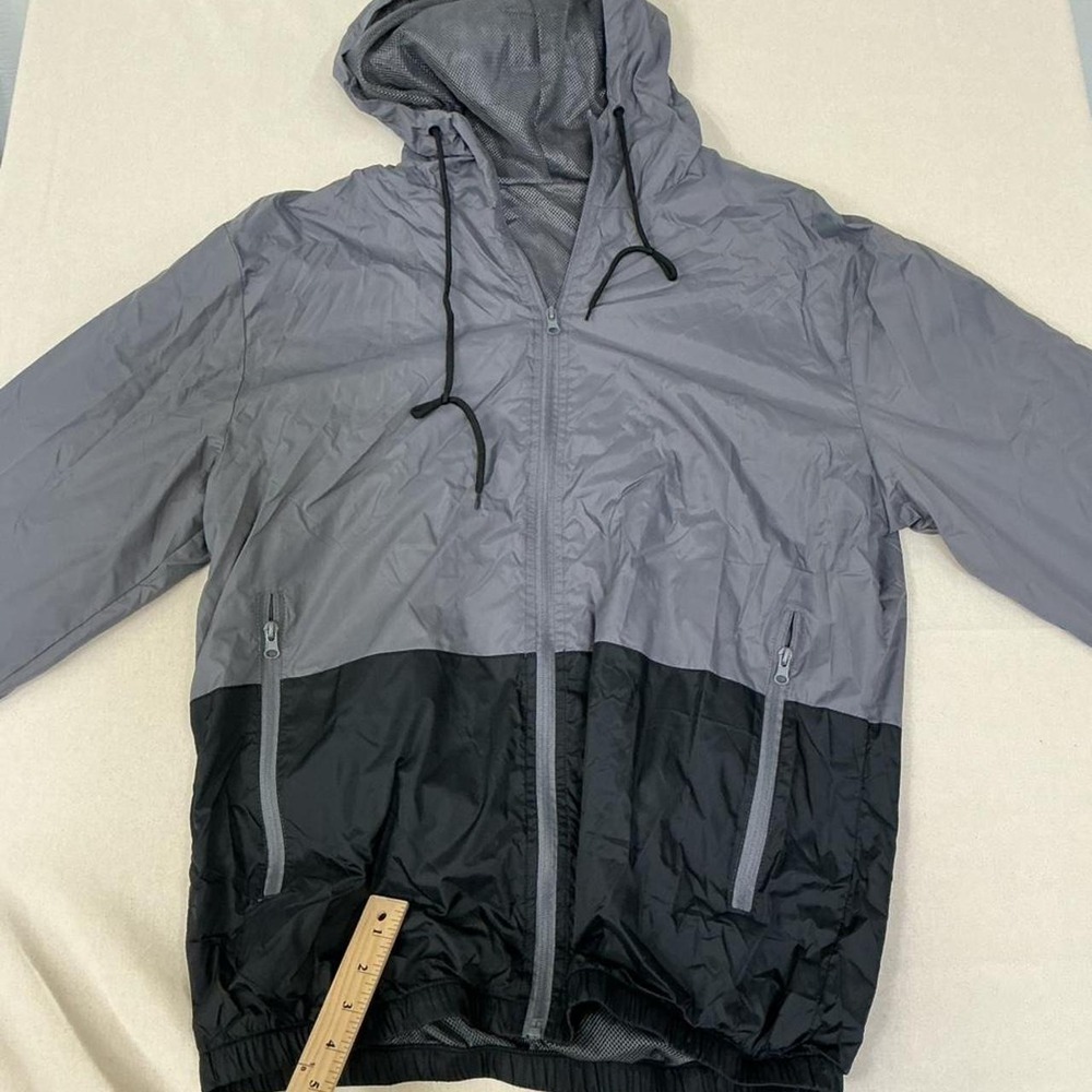Lightweight gray and black windbreaker jacket